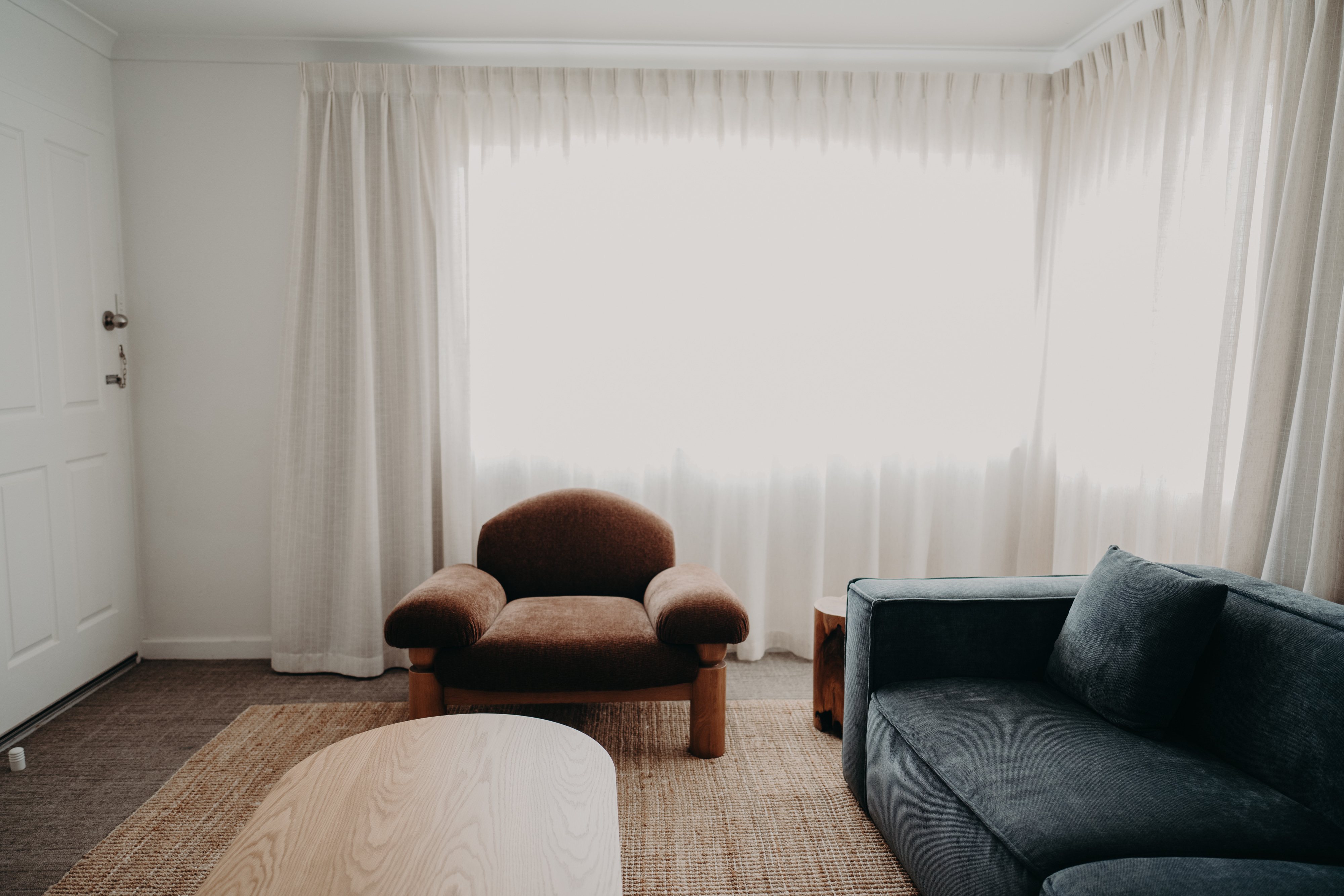 Living room at Albany Motel & Apartments