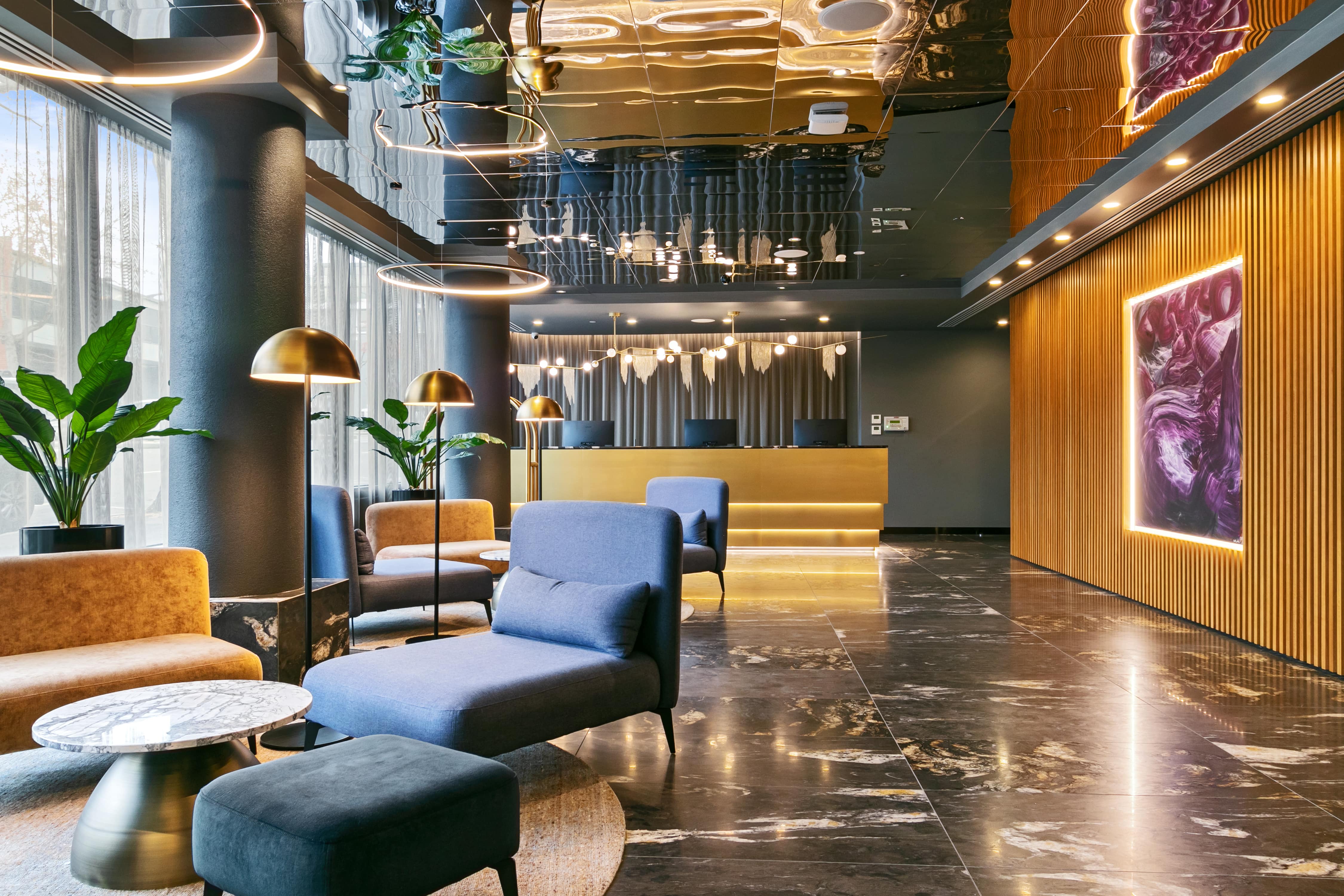 Hotel lobby lounge at Melbourne City Apartment Hotel in West Melbourne, one of the independent hotels Indi runs commercial services for